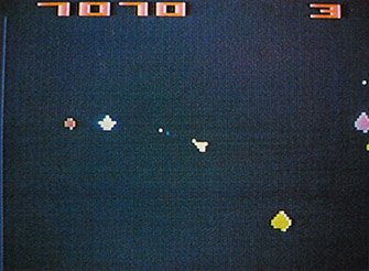 Lying in wait for Satellites and UFOs when there are only a few Asteroids left on the screen is an easy way to rack up points.