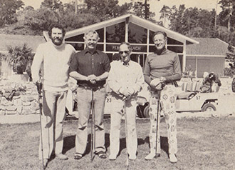 FOUR: Bushnell, Keenan, former coin-op president Joe Robbins and some guy in crazy-looking pants at Pebble Beach. Keenan calls Bushnell “the Henry Ford of the video game business.”